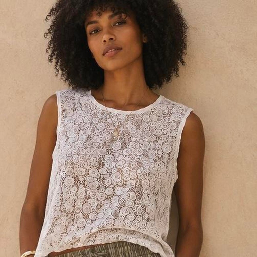 White lace blouse with floral pattern